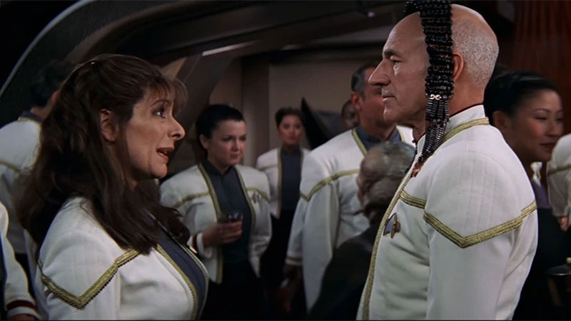 Deanna Troi comments on Picard's Evora headdress Star Trek Insurrection